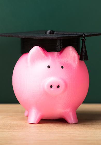 piggy bank with graduation cap